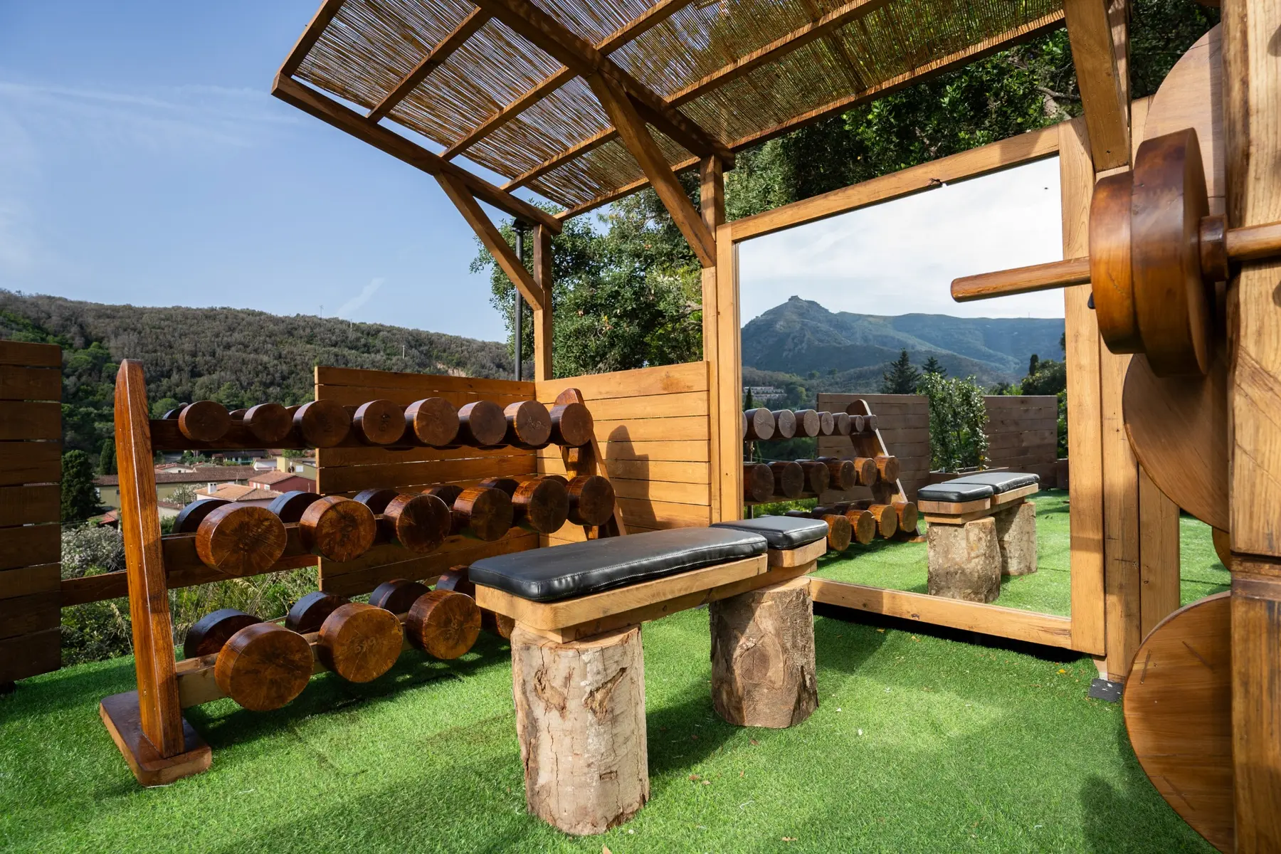 The outdoor Raw Gym surrounded by greenery